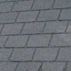 Dolls house with dark grey slate roof