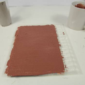 Apply buff colour compound over stencil